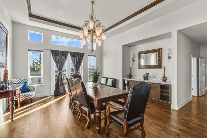 Kitchen opening into a light-filled dining space